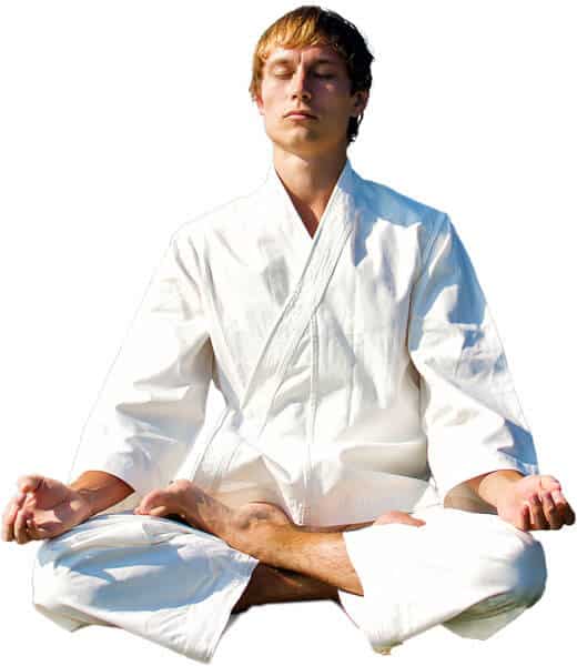 Martial Arts Lessons for Adults in Alpharetta GA - Young Man Thinking and Meditating in White