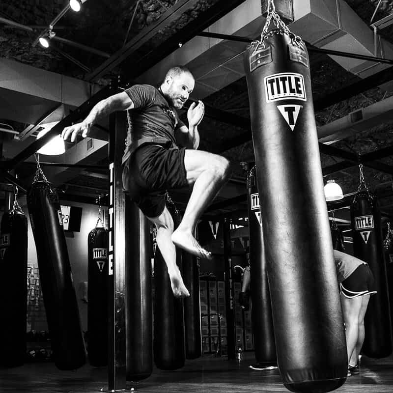 Mixed Martial Arts Lessons for Adults in Alpharetta GA - Flying Knee Black and White MMA